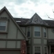 Photo by Integrity Roofing, Siding, Gutters & Windows. Overland Park, KS Wood Shake Re-Roof - thumbnail