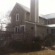 Photo by Ohio Exteriors. Mastic Board & Batten vinyl siding in Harbor Gray  - thumbnail