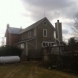 Photo by Ohio Exteriors. Mastic Board & Batten vinyl siding in Harbor Gray  - thumbnail