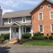 Photo by Ohio Exteriors. Mastic Board & Batten vinyl siding in Harbor Gray  - thumbnail