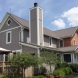 Photo by Ohio Exteriors. Mastic Board & Batten vinyl siding in Harbor Gray  - thumbnail