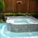 Photo by Gold Medal Pools & Outdoor Living. Spas - thumbnail