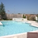 Photo by Gold Medal Pools & Outdoor Living. Straight Line Pools - thumbnail