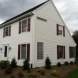 Photo by Custom Concepts Construction. James Hardie Arctic White Lap Siding - thumbnail