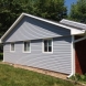 Photo by Moss Roofing. Insulated Siding Before and After - thumbnail