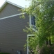 Photo by Erdmann Exterior Designs Ltd.. James Hardie Siding Project: Elgin, IL  - thumbnail