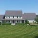 Photo by Care Free Homes Inc.. Custom Built Colonial with Farmer's Porch in South Dartmouth, MA - thumbnail