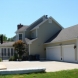 Photo by STL Siding Pros. Sandstone Beige James Hardie Siding - thumbnail