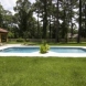 Photo by Aquamarine Pools of Houston. Poseidon, Granite - thumbnail