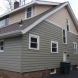 Photo by Ohio Exteriors. Stone, Shake, Siding, Windows ... The Works! - thumbnail