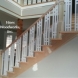 Photo by Vines Woodworks, Inc.. Custom stairs - thumbnail